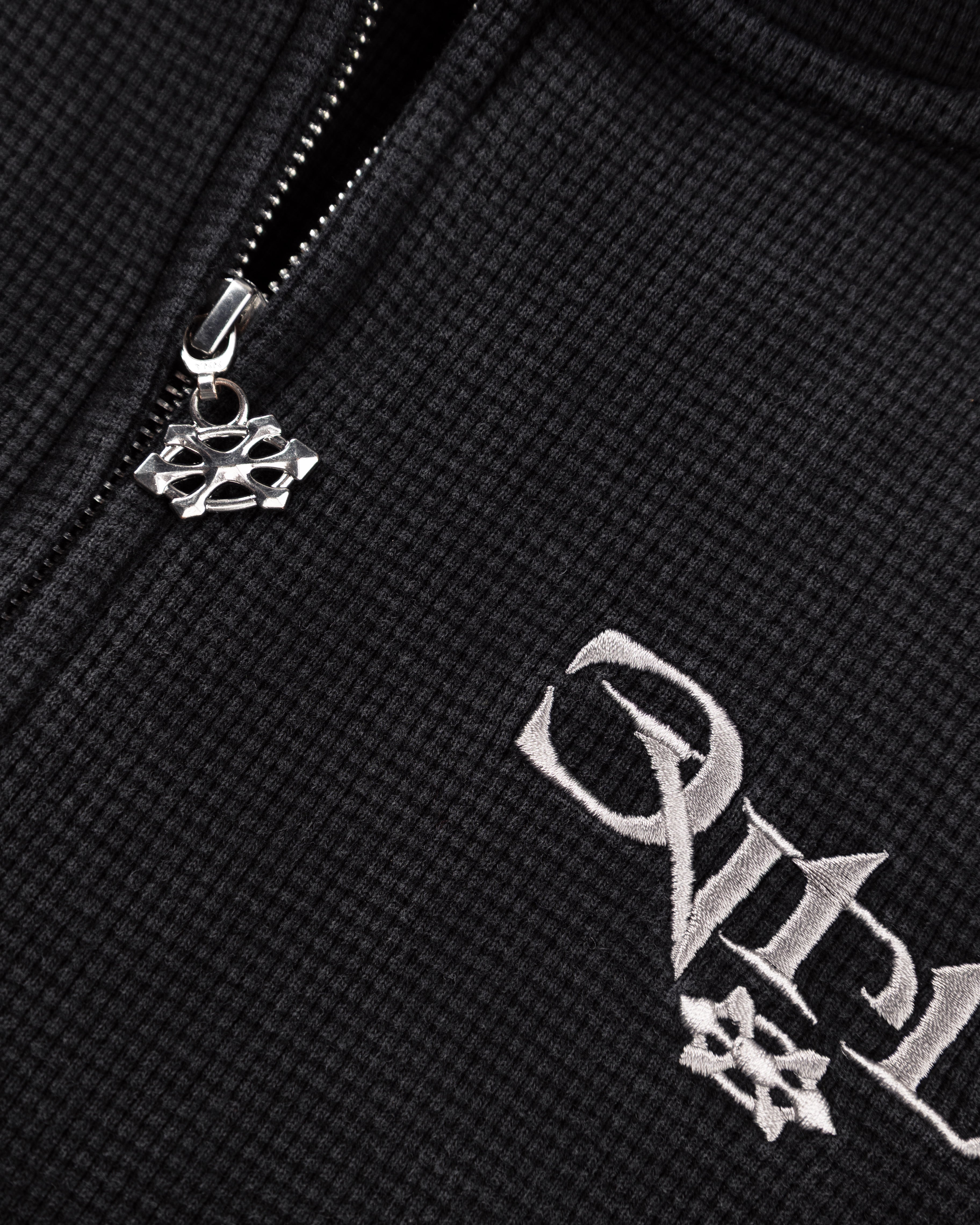 BRUTALIST BLACK WAFFLE ZIP