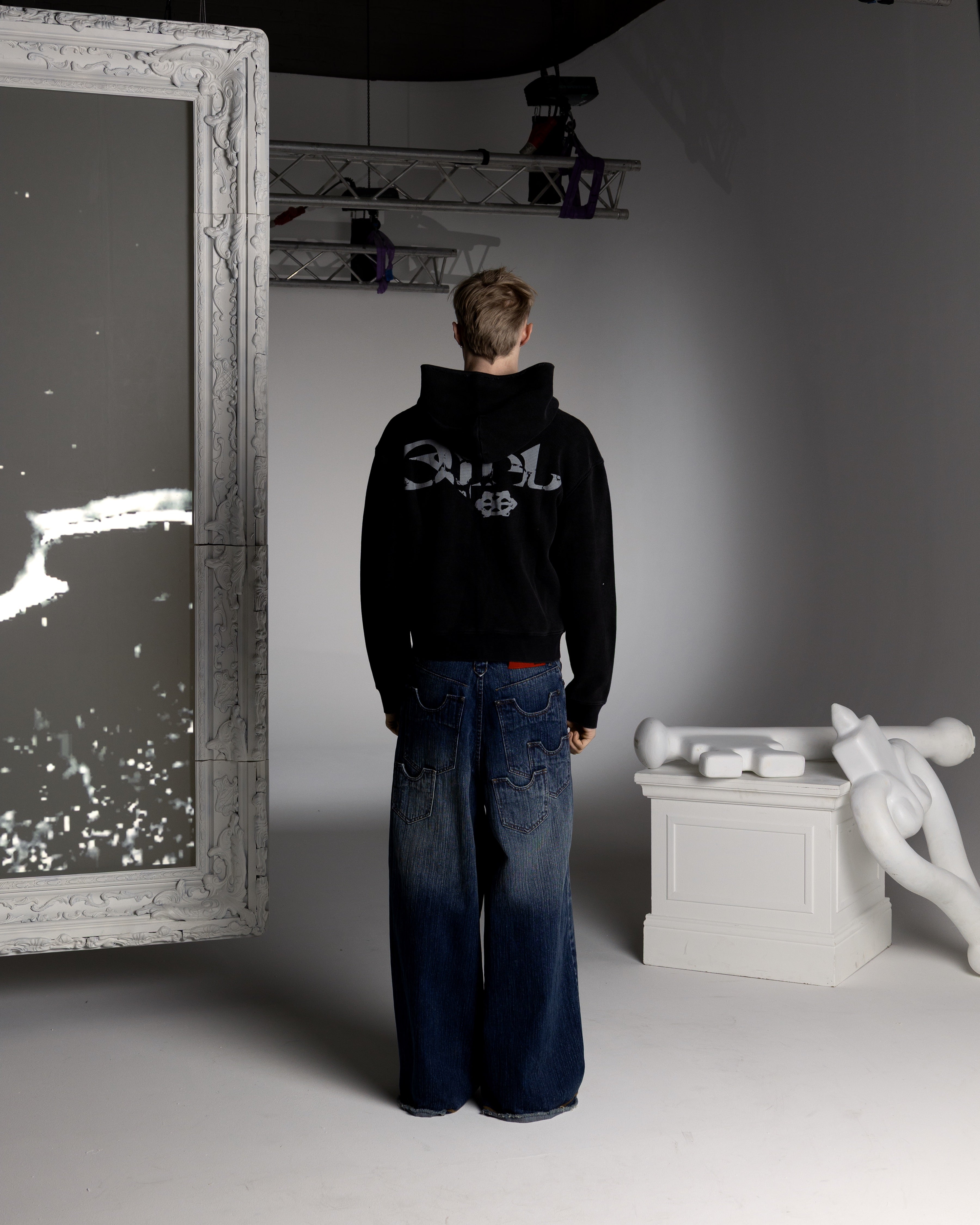 BRUTALIST BLACK WAFFLE ZIP